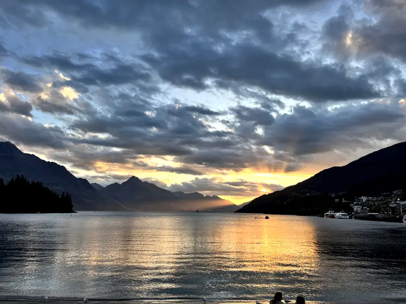 Sunset over the lake at Queenstown, cloud lit from underneath.
