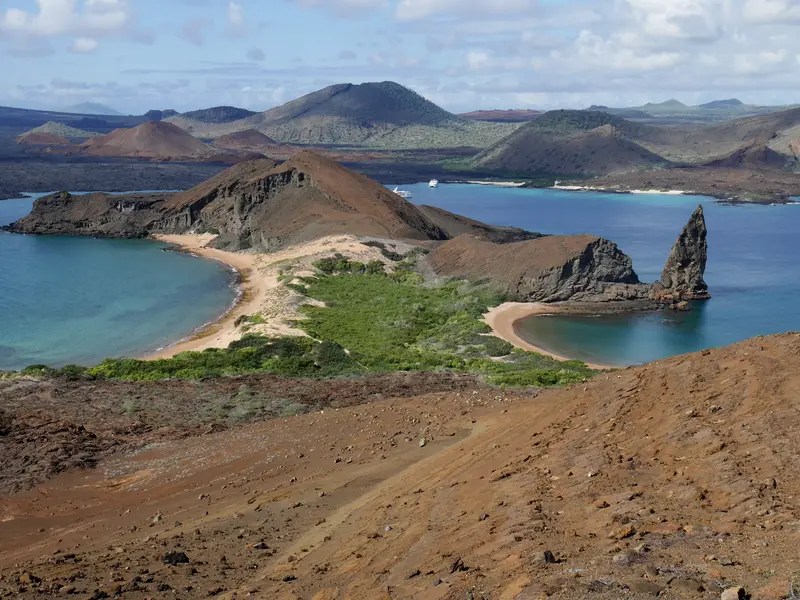 The same bay from higher on the Bartolomé trail, the volcanic ridge running down to the water.