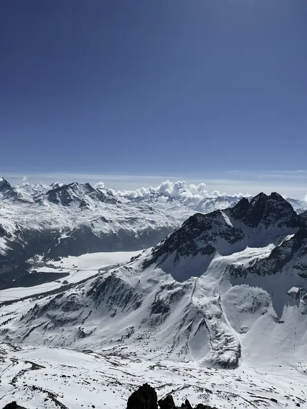 Deep blue sky over the peaks above Zermatt, no cloud anywhere in it.